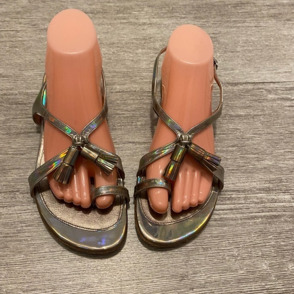 Stuart Weitzman pewter size 8M sandals W toe hold and back strap. Has tassels